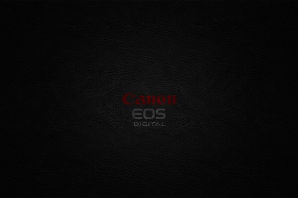 Sfondo del desktop scuro con logo Canon