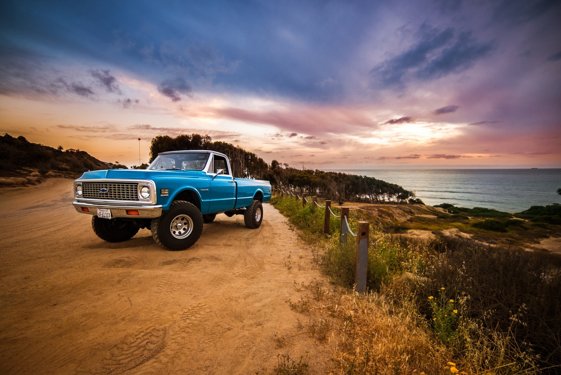 chevrolet 1972 lato anteriore ruote strada recinzione mare nuvole cielo tramonto