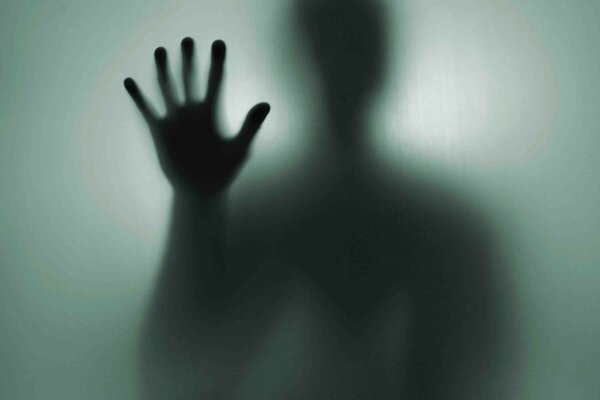 La mano di uno sconosciuto nell ombra