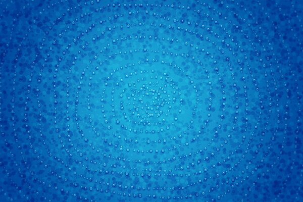 Gocce rotonde su sfondo blu