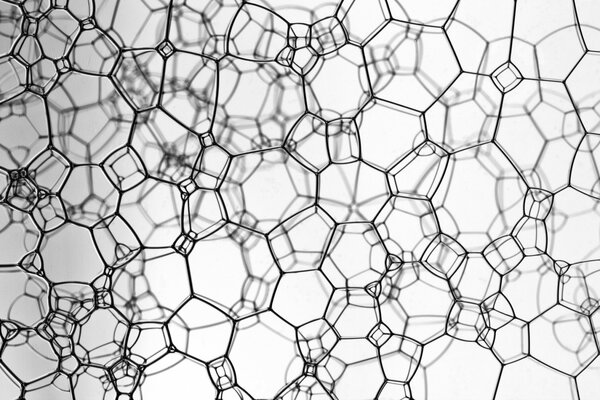 Bolle nere su sfondo bianco Stile astrazione