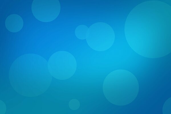 Cerchi di colore blu di diverse dimensioni su sfondo blu