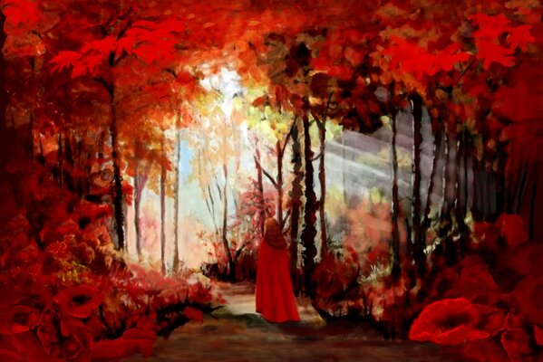 Ragazza in un mantello nella foresta rossa