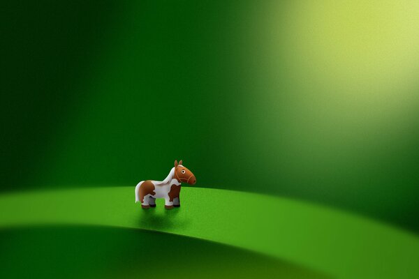 Piccolo pony su una foglia verde
