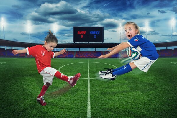 Immagine divertente con i bambini e la palla