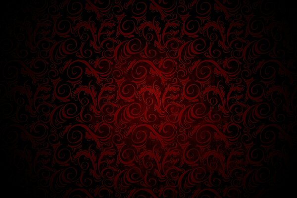 Ornamento rosso su sfondo nero