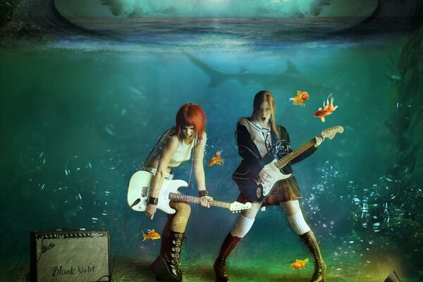 Concerto di ragazze con chitarre sott acqua