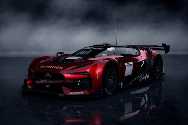 Gran turismo cinque su uno sfondo di nebbia con riflessione nel pavimento