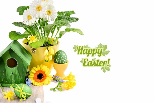 Festa della Santa Pasqua, uova e gerbere festive sul tavolo