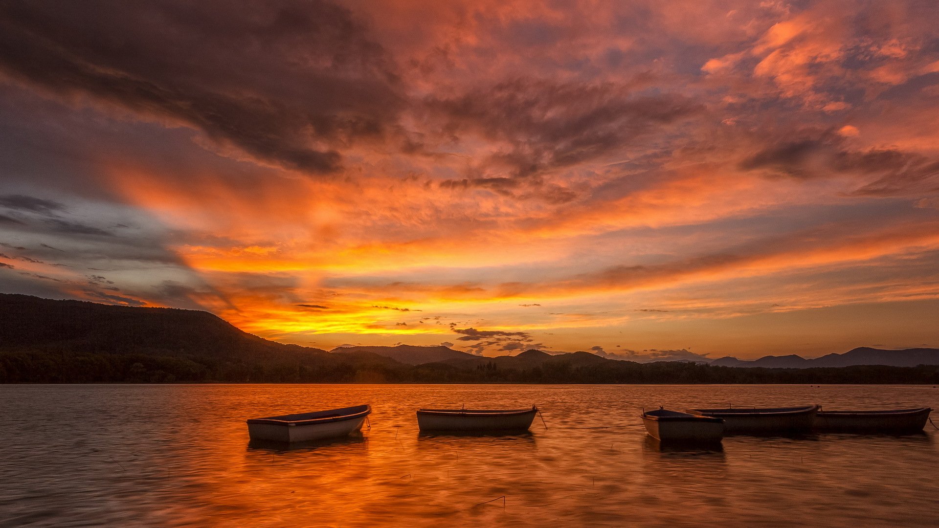 tramonto lago barche