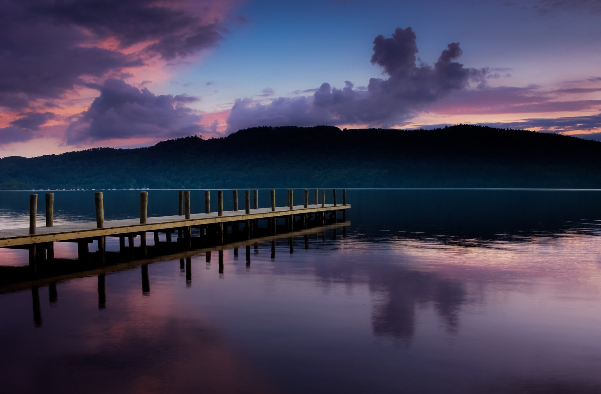 molo tramonto lago foresta cielo nuvole