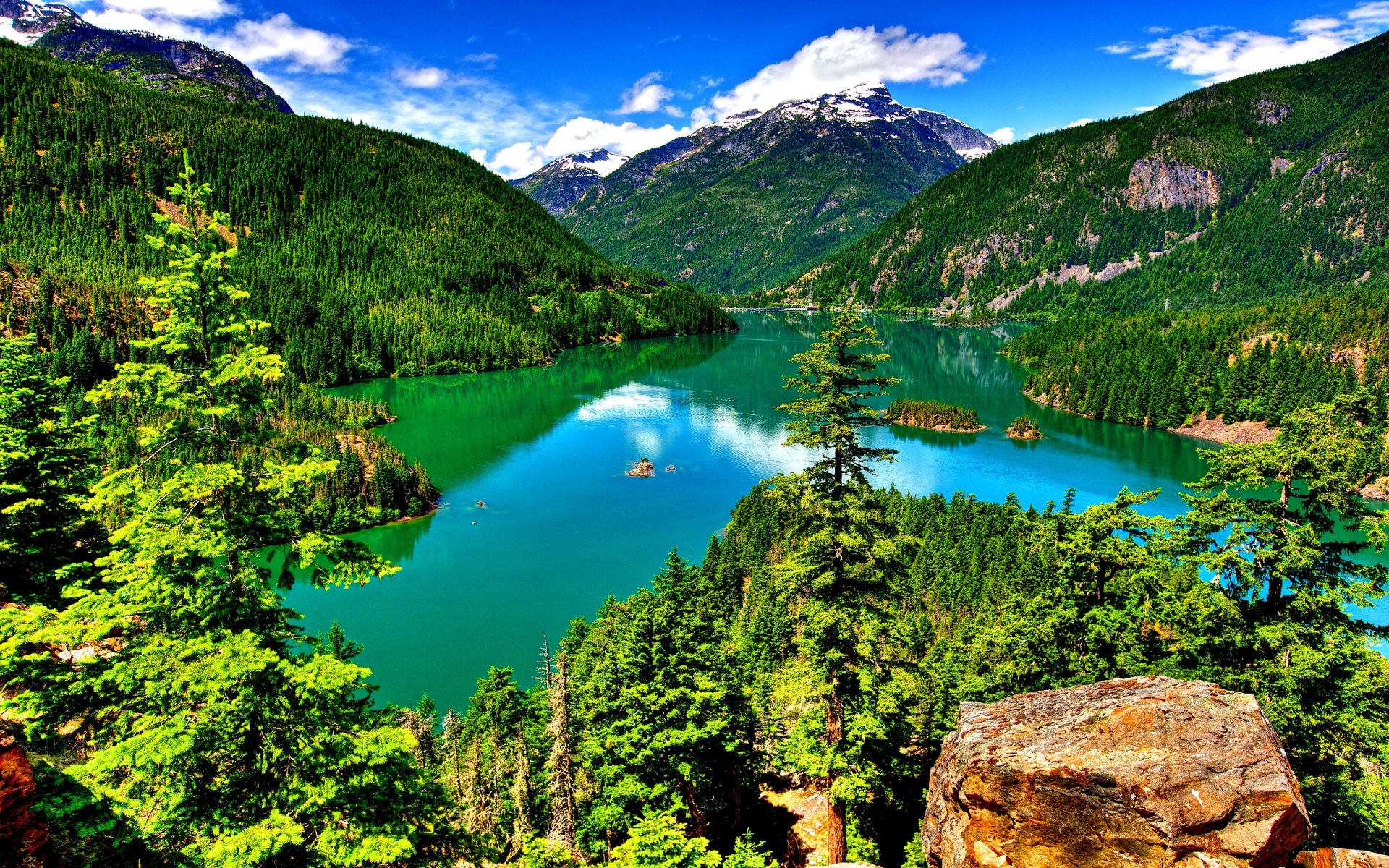 montagne foresta alberi rocce lago cielo nuvole